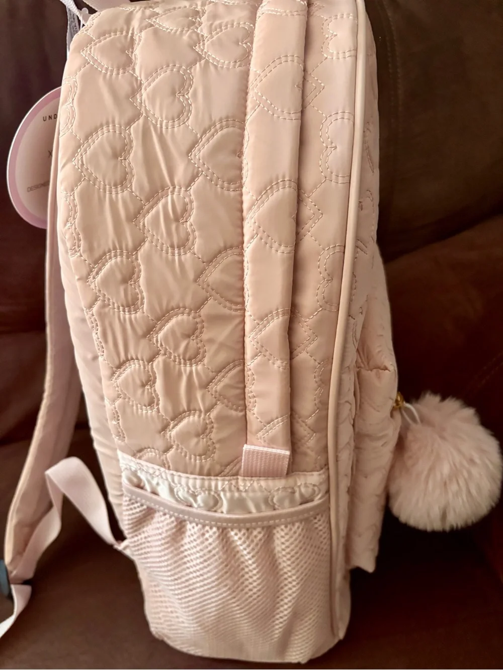 Under One Sky Quilted Heart Backpack in Light Pink with Pom Pom